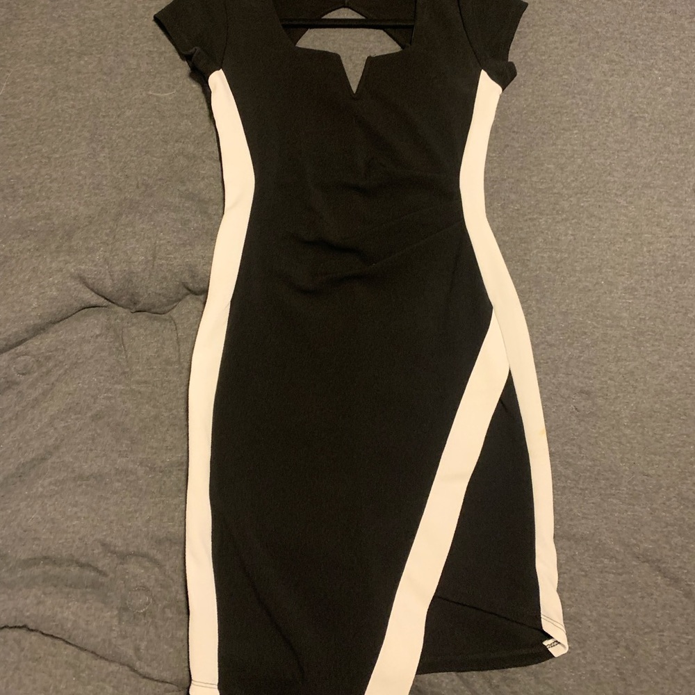 Black and white fitted, asymmetrical, cutout back dress